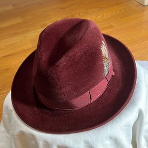 Wine fedora with feathers in size 71/8 brand new never worn before.